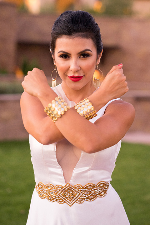 wonder-woman-meets-superman-bride-arms-crossed-bride-in-a-white-silk-short-dress-with-her-wonder-woman-head-piece-and-arms-crossed-in-superpower-pose