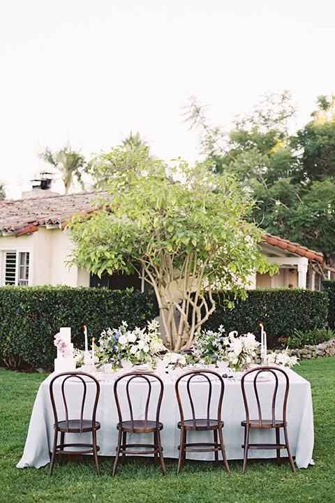 Inn-at-rancho-santa-fe-shoot-table-set-up-distance-shot-white-table-linens-with-brown-chairs