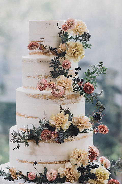 amanda-and-codys-wedding-at-the-1909-cake-four-tiers-with-natural-frosting-with-florals-cascading-down