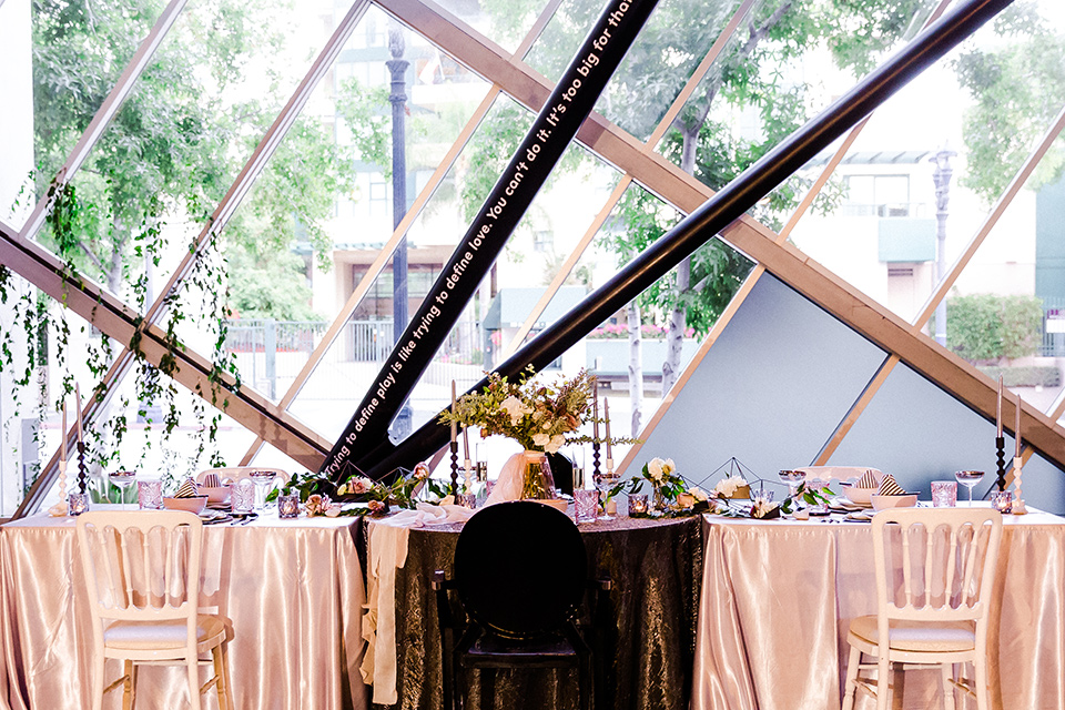 Childrens-museum-shoot-table-set-up-white-and-black-linens-and-tableware