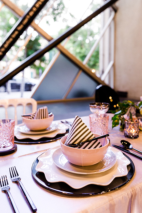 Childrens-museum-shoot-tableware-black-charger-plates-with-white-plates-and-bowls