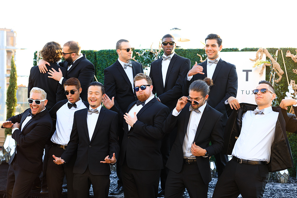 evolution-of-style-party-group-of-guys-in-black-tuxedos-a-bunch-of-guys-in-black-tuxedos-making-a-funny-face-and-posing-at-the-fifth-restaurant