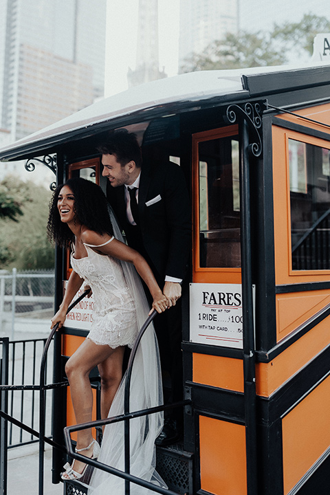  downtown Los Angeles elopement with the bride in a mini dress and the groom in a black tuxedo – by Angeles Landing 