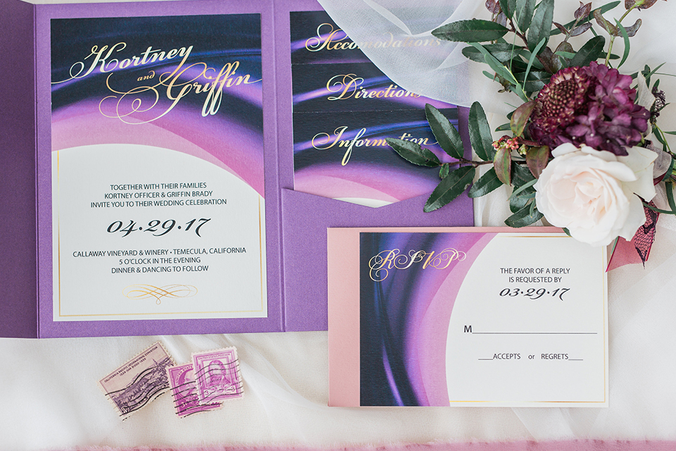 Temecula outdoor wedding at callaway winery wedding invitations white and purple with calligraphy writing and design and white linen background decor wedding photo idea for invitations