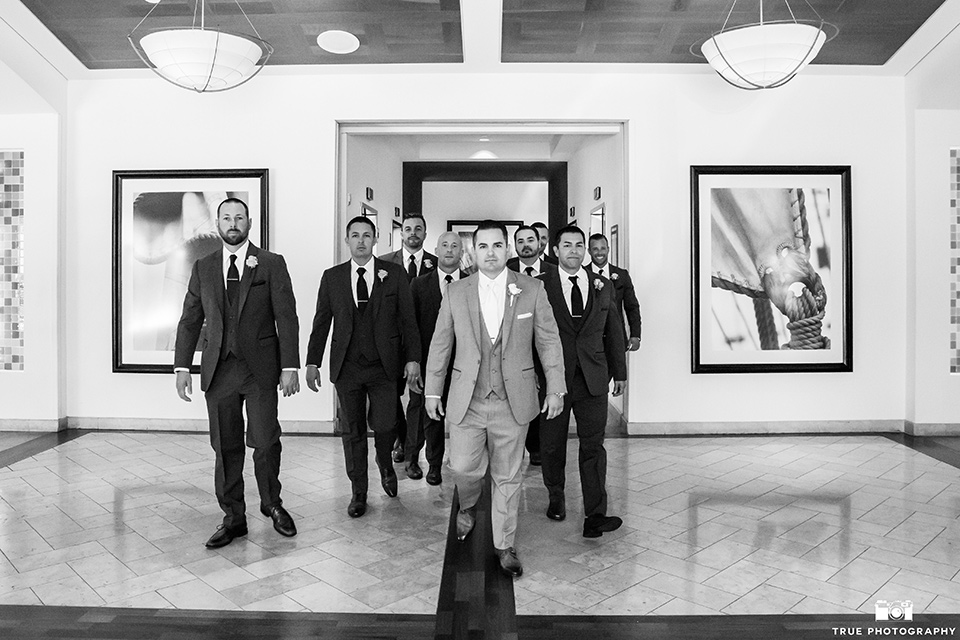 skybox-venue-wedding-blackandwhite-groomsmen-photos-groomsmen-in-dark-grey-suits-groom-in-light-grey