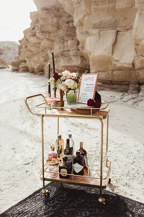 Anza-Borrego-styled-shoot-bar-cart-gold-bar-cart-with-reception-decor