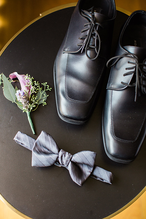 Avenue-of-the-arts-wedding-men-accessories-groom-inblack-tuxedo-with-a-silver-vest-and-silver-bowtie