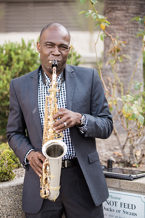 Avenue-of-the-arts-wedding-saxaphone-player