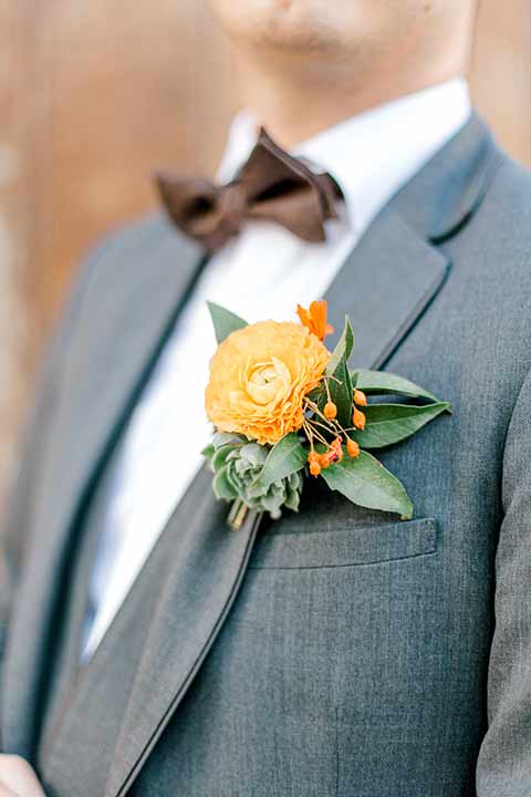 estate-on-second-shoot-close-up-on-groom-accessories-groom-in-a-charcoal-grey-tuxedo-with-a-dark-brown-bow-and-shoes