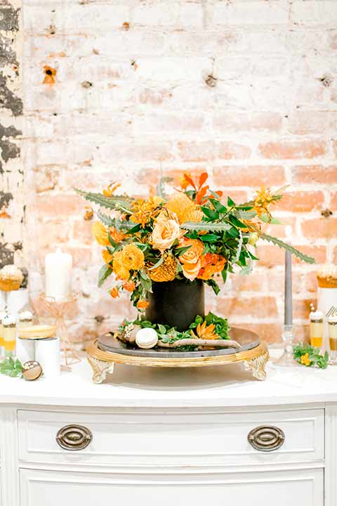 estate-on-second-shoot-florals-on-white-table-orange-and-cream-florals