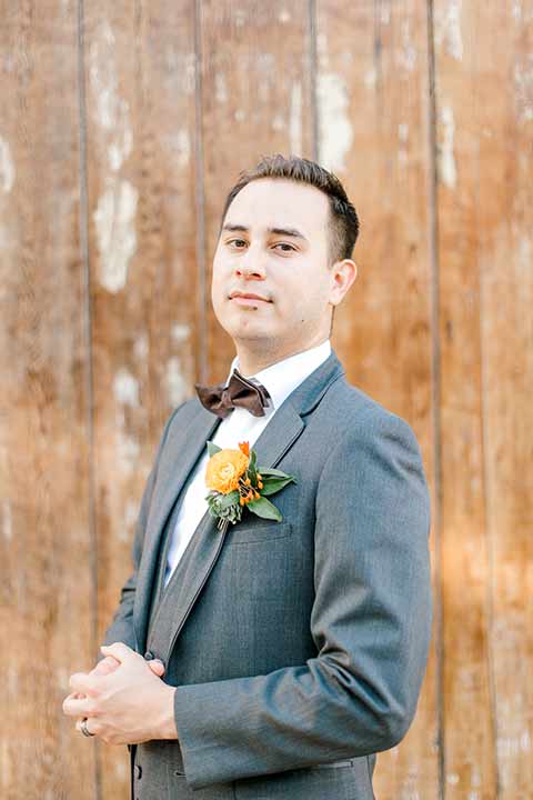 estate-on-second-shoot-groom-style-groom-accessories-groom-in-a-charcoal-grey-tuxedo-with-a-dark-brown-bow-and-shoes