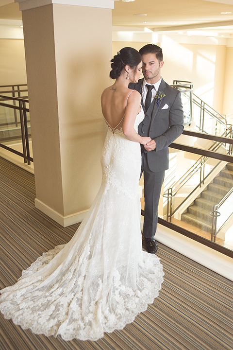  Grand-Pacific-Palisades-Groom-in-charcoal-tuxedo-with-a-long-black-tie-bride-in-a-lace-dress-with-straps 