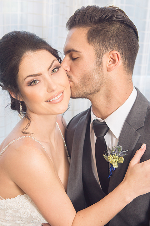  Grand-Pacific-Palisades-Groom-in-charcoal-tuxedo-with-a-long-black-tie-bride-in-a-lace-dress-with-straps 