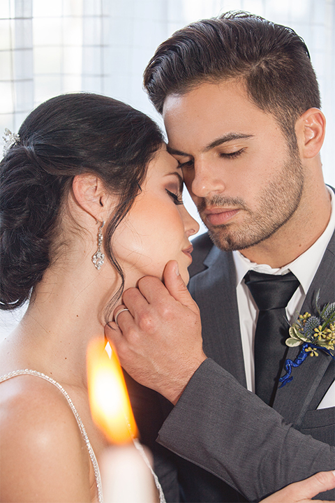  Grand-Pacific-Palisades-Groom-in-charcoal-tuxedo-with-a-long-black-tie-bride-in-a-lace-dress-with-straps 