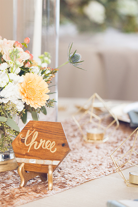  Grand-Pacific-Palisades-small-wooden-table-décor-with-calligraphy