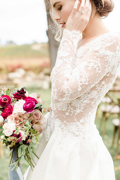 hammersky-editorial-shoot-close-up-on-bride-bride-in-a-tulle-ballgown-with-lace-sleeves-and-high-neckline