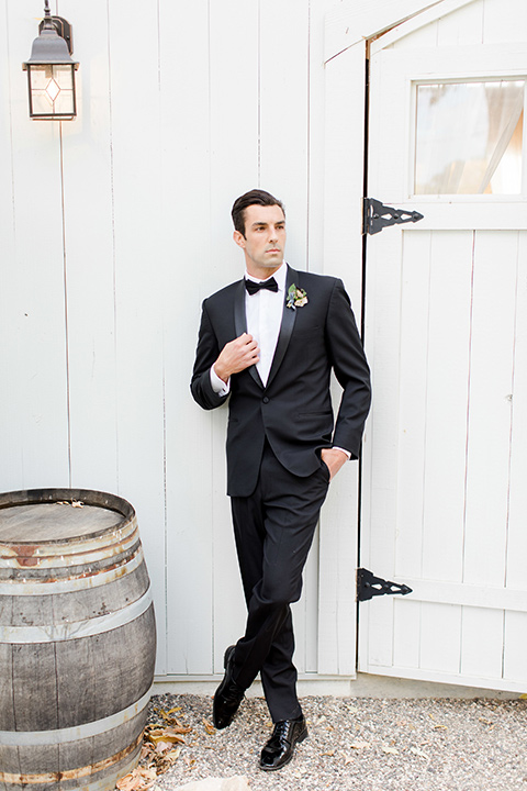 hammersky-editorial-shoot-groom-groom-in-a-black-shawl-lapel-tuxedo-with-black-bow