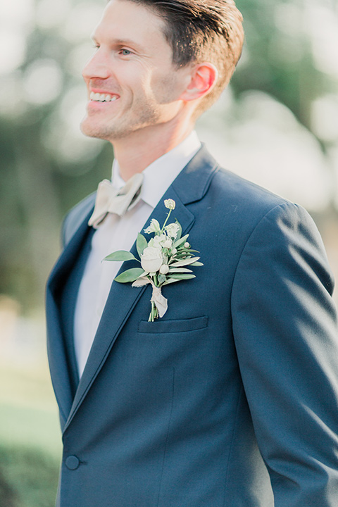 MUCKENTHALER-SHOOT-groom-smiling-turned-sideways