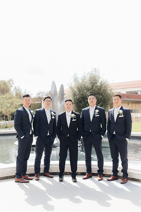 occidental-college-wedding-groomsmen-by-fountain