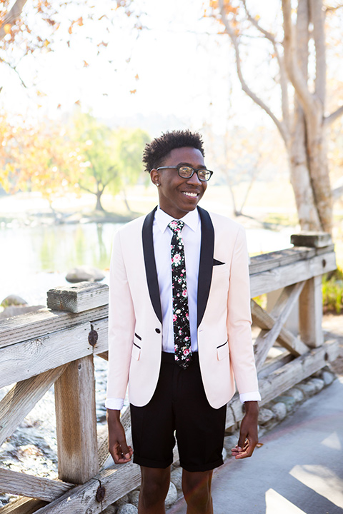 blush-tuxedo-with-black-shorts-and-a-floral-tie