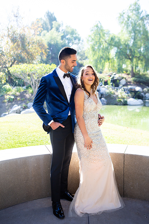 champagne-dress-with-blue-velvet-coat-look-with-black-pants-and-black-bow-tie