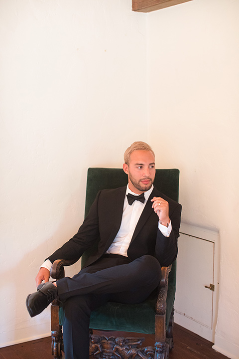 rockwood-shoot-groom-sitting-in-chair-looking-away