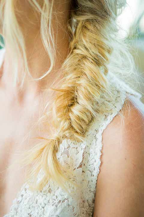 seapoint-bridal-shoot-bridal-braid-bride-in-a-lace-gown-with-thick-lace-straps-and-hair-in-a-loose-braid