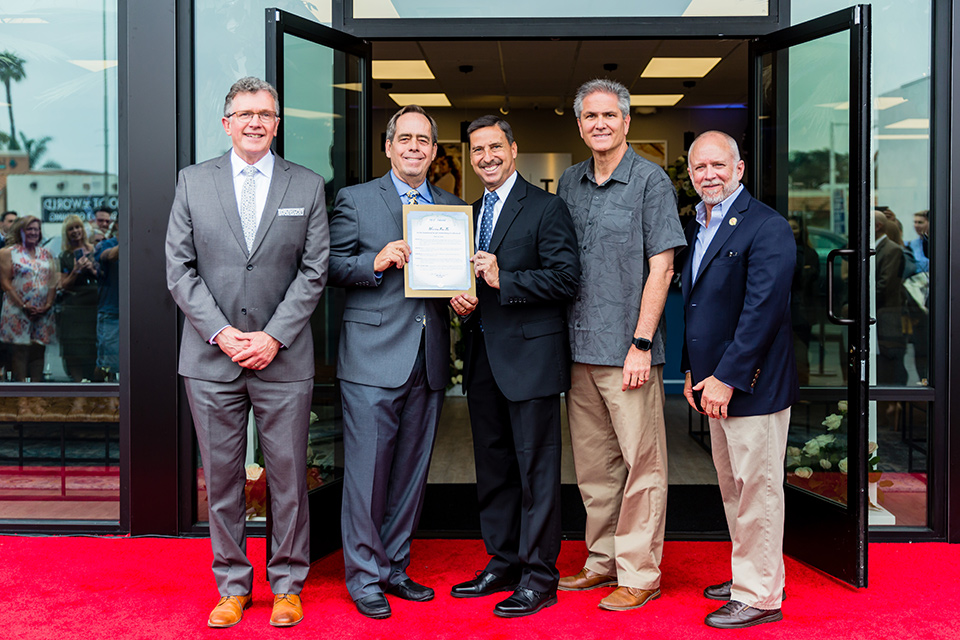 Lakewood-store-45th-anniversary-party-owners-and-the-mayor-posing-for-pictures