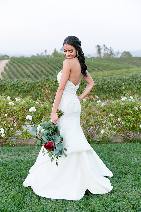 Villa-de-Amore-bride-standing-alone-bride-in-a-fitted-gown