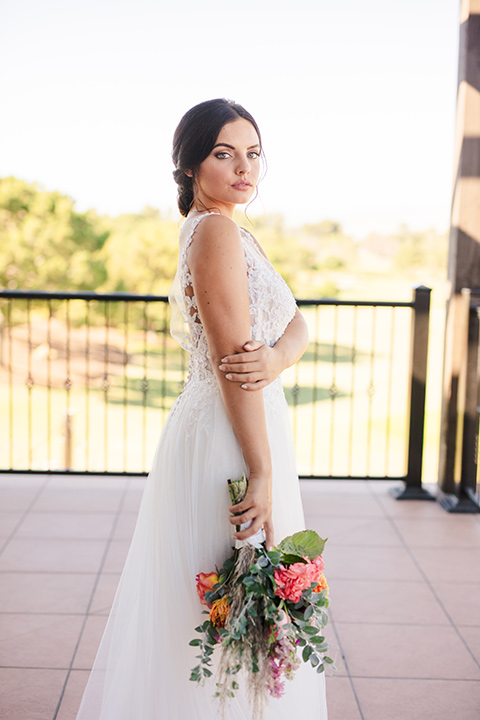 aliso Viejo wedding design with the bride in a lace gown with thin straps