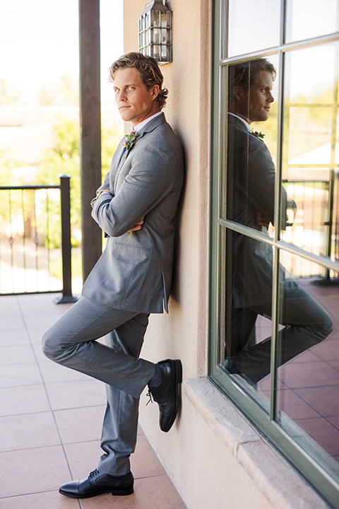 aliso viejo wedding design with the groom in a grey suit and navy neck tie