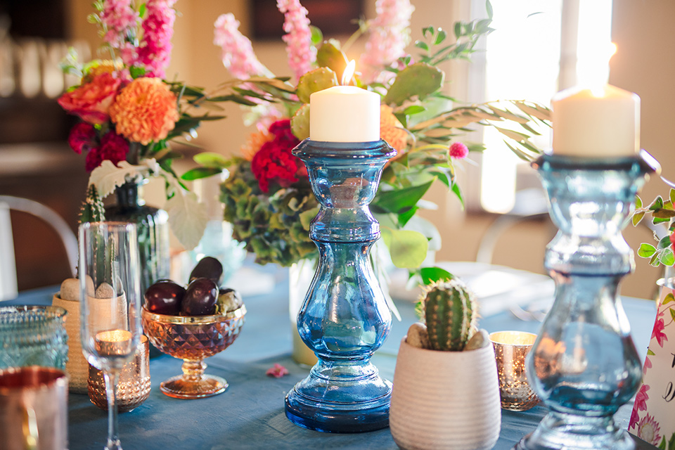 Aliso Viejo wedding design with blue crystal and colorful flowers