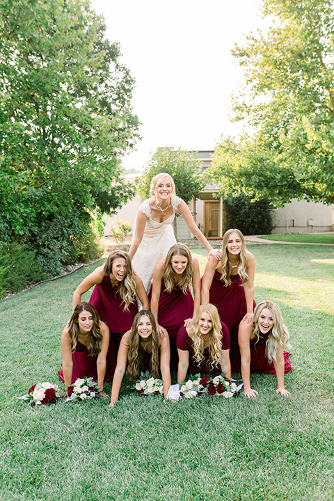 Burgundy-and-Blue-wedding-bridesmaids-in-tower-in-burgundy-gowns