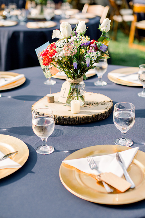 Burgundy-and-Blue-wedding-table-décor-with-dusty-blue-linens-and-white-and-gold-flatware