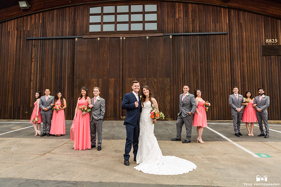 Entire bridal in front of wooden venue