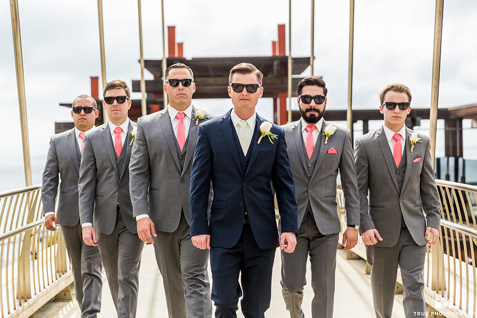 Grooms and groomsmen pose in La Jolla 