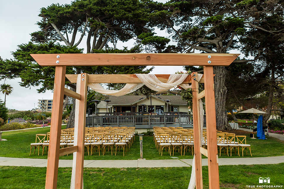 Martin Johnson House wedding ceremony with an wooden arch