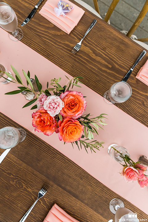 Martin Johnson House wedding table decor with light pink and floral linens pink florals and gold flatware