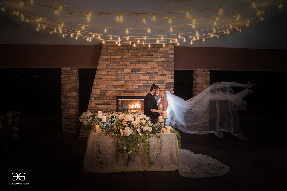 Bears-Best-Venue-Wedding-Shoot-bride-and-groom-in-reception-space-bride-in-a-lace-mermaid-gown-and-groom-in-a-black-tuxedo