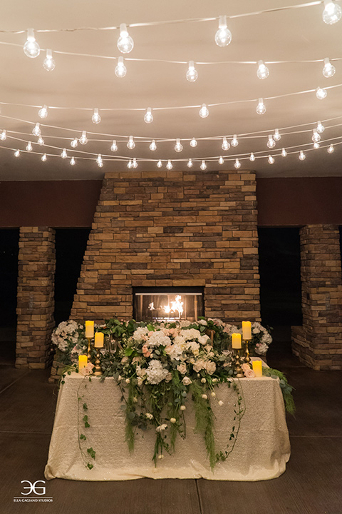 Bears-Best-Venue-Wedding-Shoot-sweetheart-table-with-white-linen-and-big-neutral-colored-roses