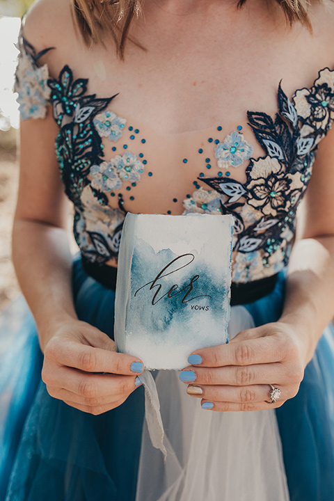 Big-Bear-Elopement-Shoot-bride-holding-vows