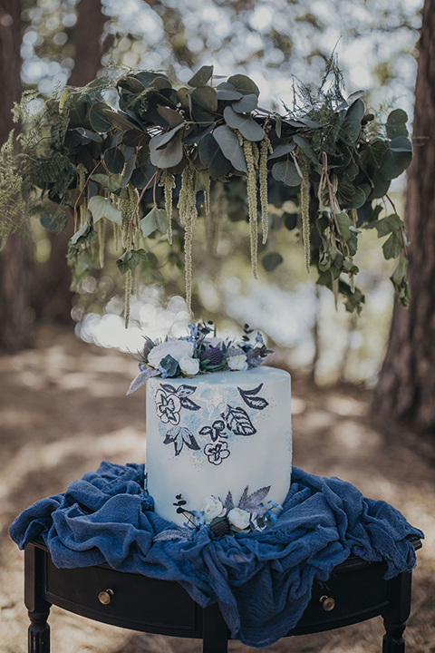 Big-Bear-Elopement-Shoot-cake-with-light-dusty-blue-fondant-and-floral-design-to-match-brides-gown