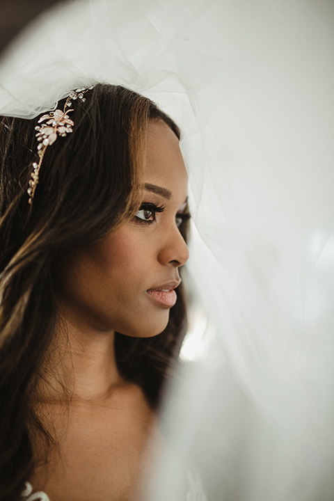 The-Ebell-In-Long-Beach-Wedding-bride-close-up-in-a-champagne-ballgown-with-a-strapless-neckline