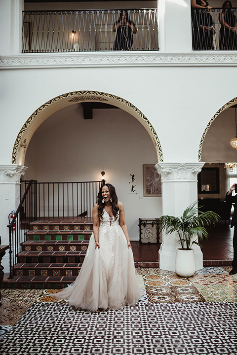 The-Ebell-In-Long-Beach-Wedding-bride-standing-in-a-strapless-ballgown