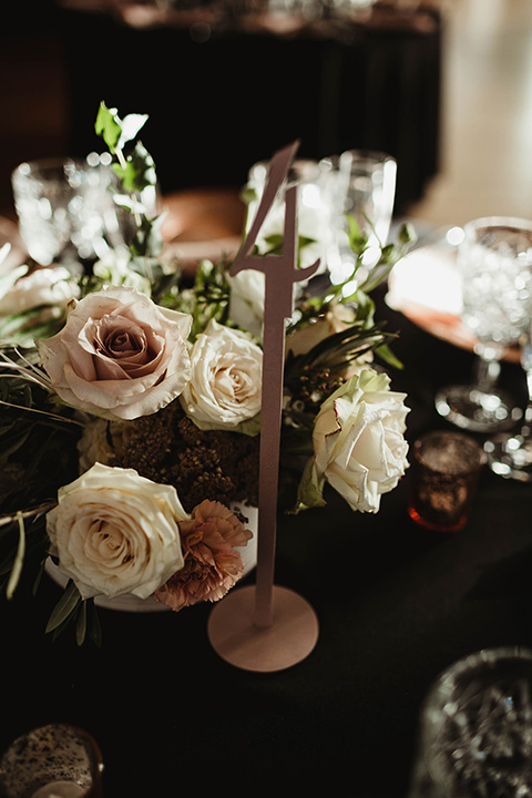 The-Ebell-In-Long-Beach-Wedding-table-florals-in-soft-pinks-and-cream-colors