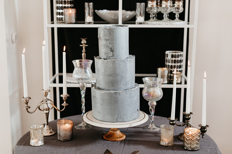 Building-177-Styled-Shoot-cake-three-tier-with-grey-fondant-and-simple-décor-surrounding-it