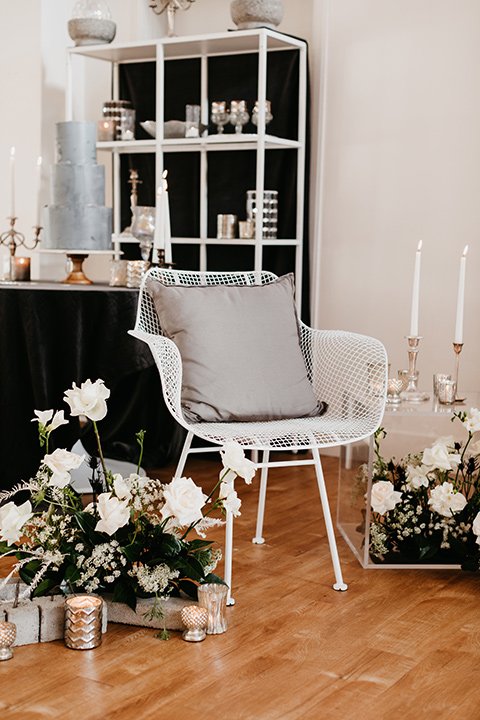 Building-177-Styled-Shoot-chairs-and-décor-in-white-and-florals-surrounding