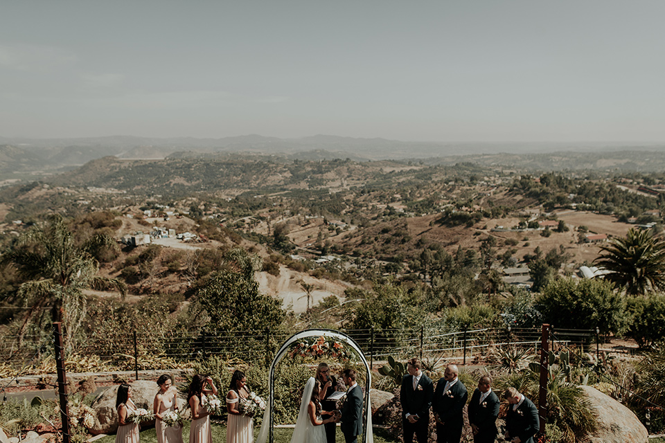 Dragon-point-villa-wedding-overlooking-ceremony