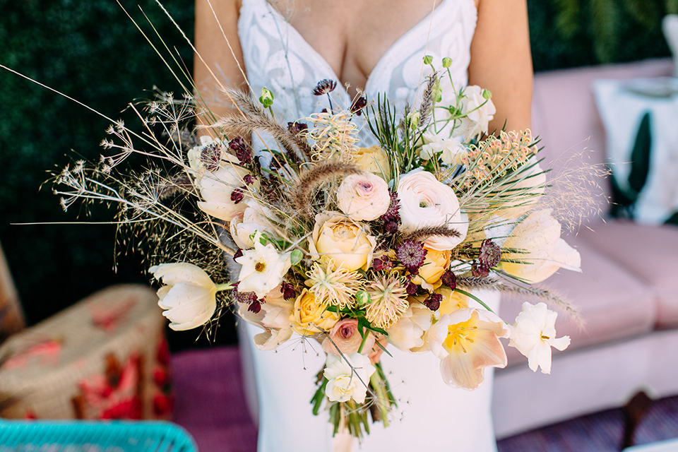 Disco style wedding bridal florals in white and yellow colors