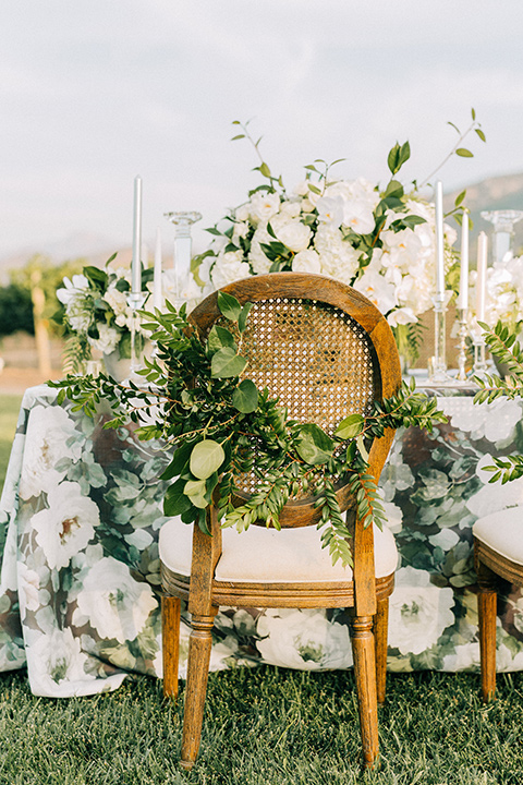 wooden chairs with flwoers